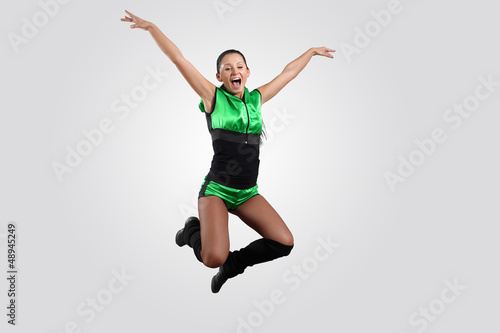 Photo: Young female dancer against white background Young female dancer against white background