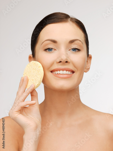 Photo: woman with sponge woman with sponge