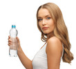 young beautiful woman with  bottle of water