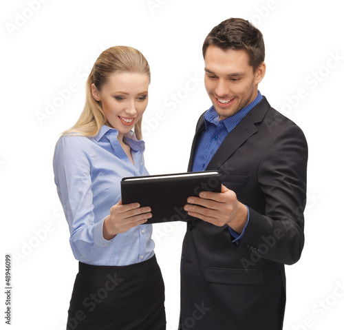 Photo: man and woman with tablet pc man and woman with tablet pc