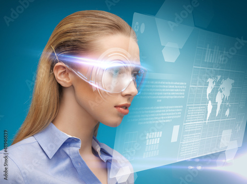 Photo: businesswoman with virtual glasses businesswoman with virtual glasses