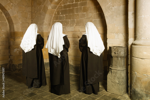 Photo: Nuns in medieval convent Nuns in medieval convent