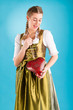 Young woman in traditional clothes - dirndl or tracht