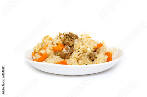 Photo: plate of pilaf on a white background plate of pilaf on a white background