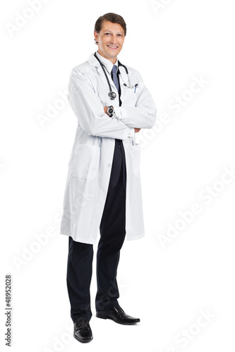 Photo: Handsome young doctor smiling Handsome young doctor smiling