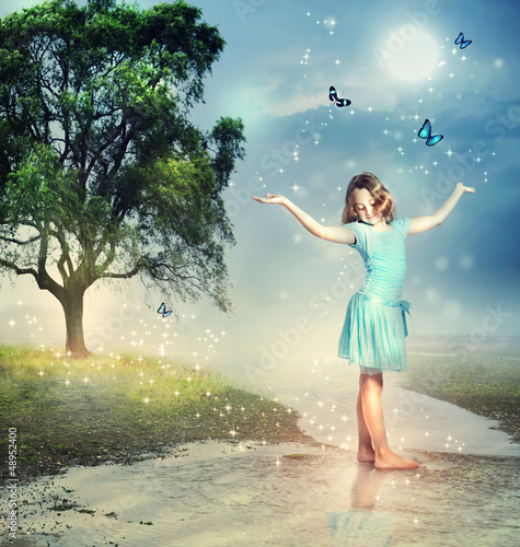 Photo: Girl with Blue Butterflies at a Magical Brook Girl with Blue Butterflies at a Magical Brook