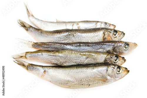 Photo: Fish food on a white background Fish food on a white background
