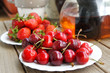 Photo: Ripe cherries and strawberries Ripe cherries and strawberries