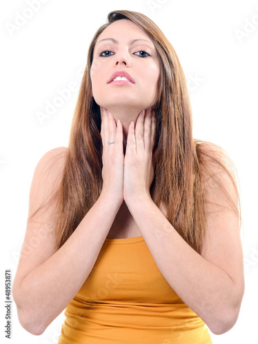 Photo: Pretty young woman sore throat isolated on white background Pretty young woman sore throat isolated on white background