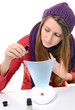 A young woman with colds and flu inhaled essential oils