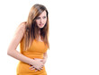 beautiful young woman stomachache on white background