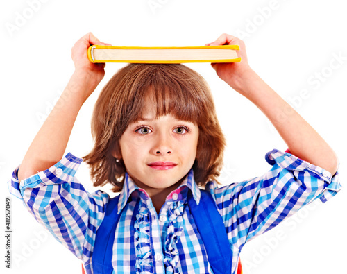 Photo: Child with stack of books. Child with stack of books.