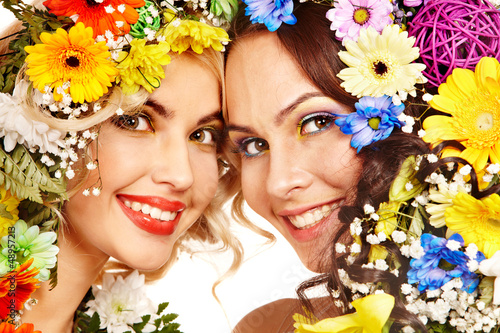 Photo: Woman with make up and flower. Woman with make up and flower.