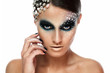 Foto: Portrait of woman with artistic make-up Portrait of woman with artistic make-up