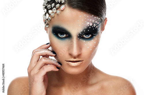 Photo: Portrait of woman with artistic make-up Portrait of woman with artistic make-up