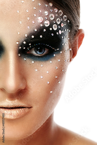 Photo: Portrait of woman with artistic make-up Portrait of woman with artistic make-up