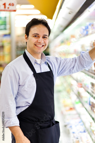 Photo: Clerk in a supermarket Clerk in a supermarket