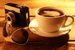 Coffee cup with retro photocamera