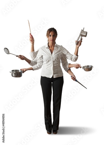 Photo: Multitasking woman in kitchen Multitasking woman in kitchen