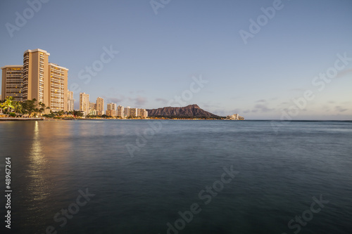 Photo: Dusk light on Waikiki Bay in Honolulu Hawaii Dusk light on Waikiki Bay in Honolulu Hawaii