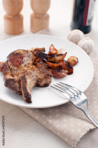 Photo: Grilled pork chop and caramelized onions Grilled pork chop and caramelized onions