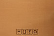 Photo: cardboard paper box with Safety fragile icon cardboard paper box with Safety fragile icon