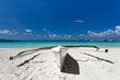 Wooden boat on tropical beach