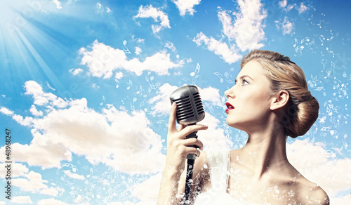 Photo: Female blonde singer Female blonde singer