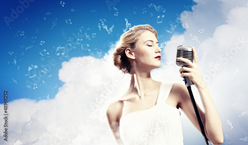 Photo: Female blonde singer Female blonde singer