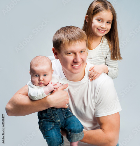 Photo: Father with babies Father with babies