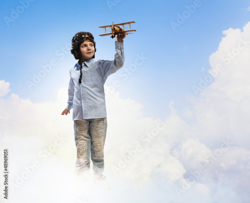 Photo: Little boy in pilot's hat Little boy in pilot's hat