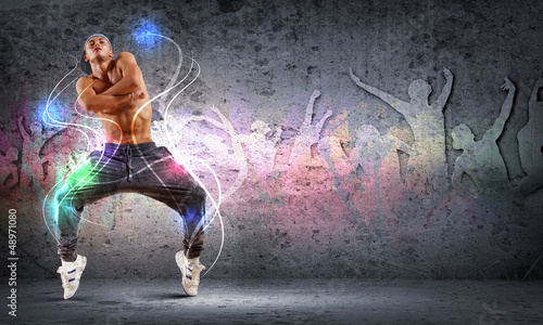 Photo: young man dancing hip hop with color lines young man dancing hip hop with color lines