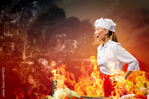 Photo: Asian female cook in anger Asian female cook in anger