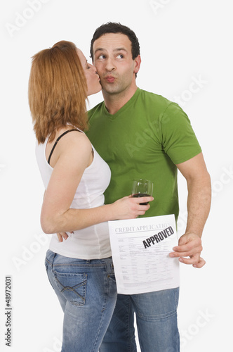 Photo: Young Couple Approved for Mortgage Young Couple Approved for Mortgage