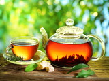 Cup of tea and teapot.