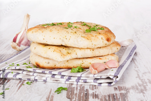 Photo: Delicious naan background. Delicious naan background.