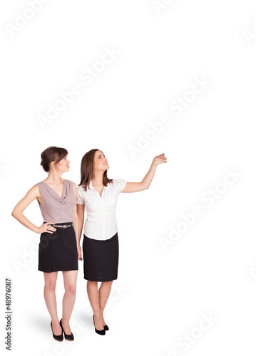 Photo: Young ladies gesturing with copy space Young ladies gesturing with copy space