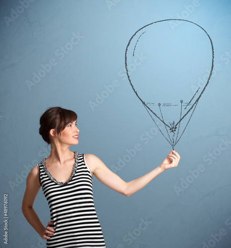 Photo: Beautiful woman holding balloon drawing Beautiful woman holding balloon drawing