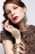 Photo: beautiful brunette in jewellery beautiful brunette in jewellery