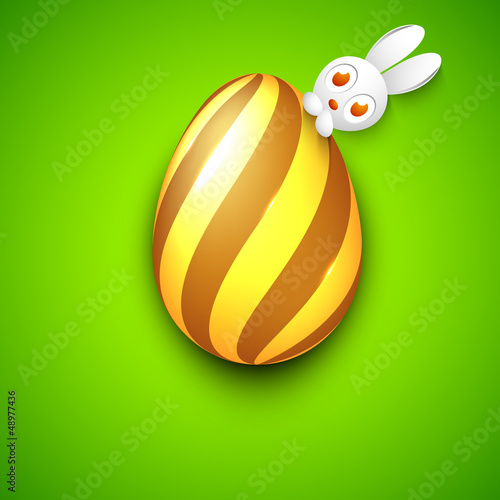 Vector: Cute Easter Bunny with golden Easter Egg on green background. EP Cute Easter Bunny with golden Easter Egg on green background. EP