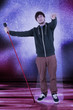 Foto: Young man at the microphone thanks the audience Young man at the microphone thanks the audience