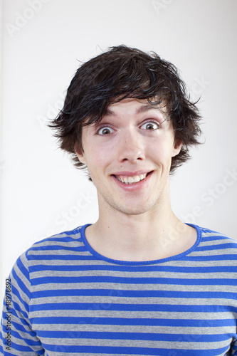 Photo: surprised male teenager surprised male teenager