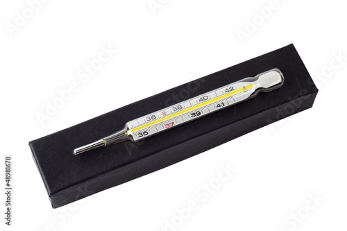 Photo: thermometer on the white background thermometer on the white background