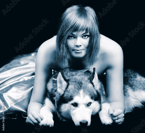Photo: portrait of young woman with dog in black and white portrait of young woman with dog in black and white