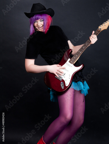 Photo: rocker girl with an electric guitar rocker girl with an electric guitar