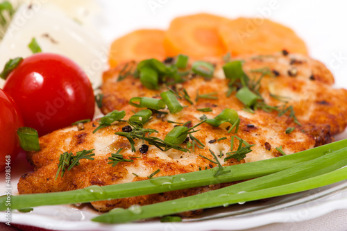 Photo: Chicken chopped meat cutlet with vegetables and greens Chicken chopped meat cutlet with vegetables and greens