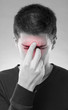 Man with sinus pain
