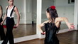 Professional dancers dancing in ballroom, steadicam shot