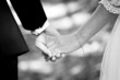 Young married couple holding hands