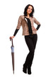 Foto: Smiling young woman with umbrella Smiling young woman with umbrella